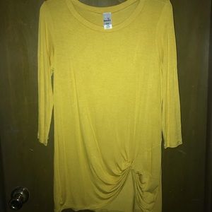Never worn. Mustard color